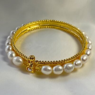 Crystal Snow Pearl Bracelet natural white pearl bracelet large white freshwater pearls with a golden metal inside and white gem stone at the clasp of the bracelet